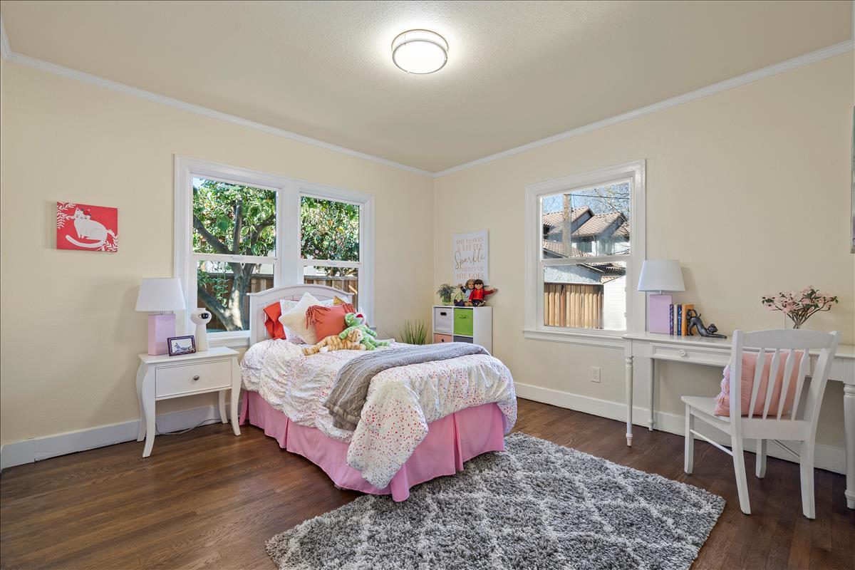 1145 Clark Way San Jose, CA 95125 - Photo 16 of 26 a bed room with a bed and a chair