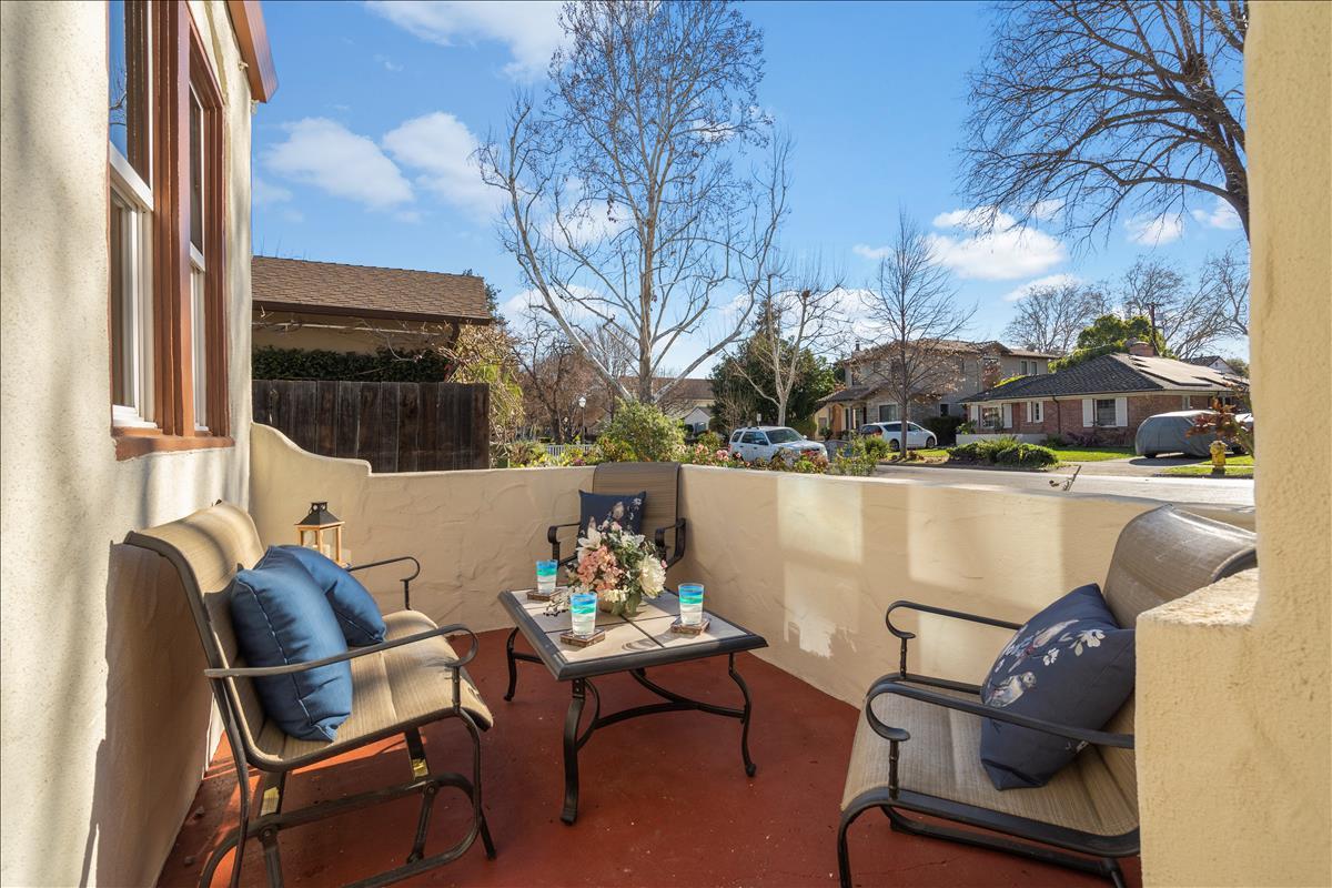 1145 Clark Way San Jose, CA 95125 - Photo 2 of 26 a balcony with table and chairs