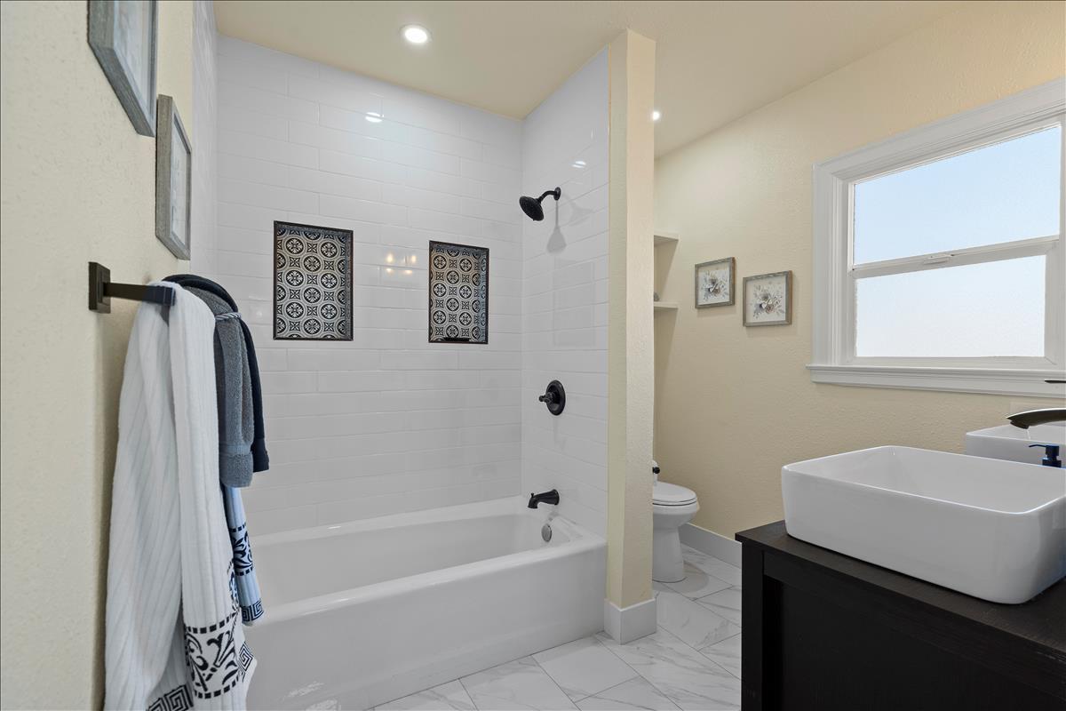 1145 Clark Way San Jose, CA 95125 - Photo 21 of 26 a bathroom with a sink a toilet and a bathtub