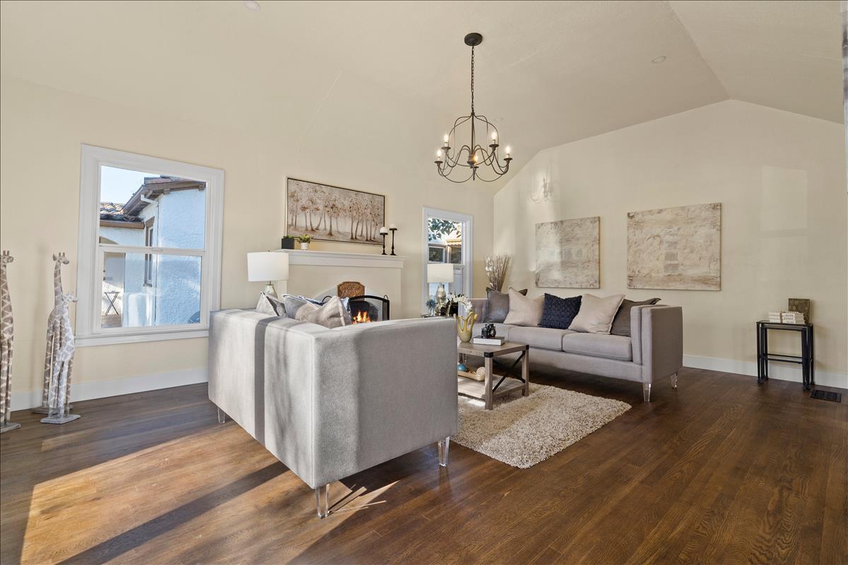 1145 Clark Way San Jose, CA 95125 - Photo 5 of 26 a living room with furniture and a chandelier