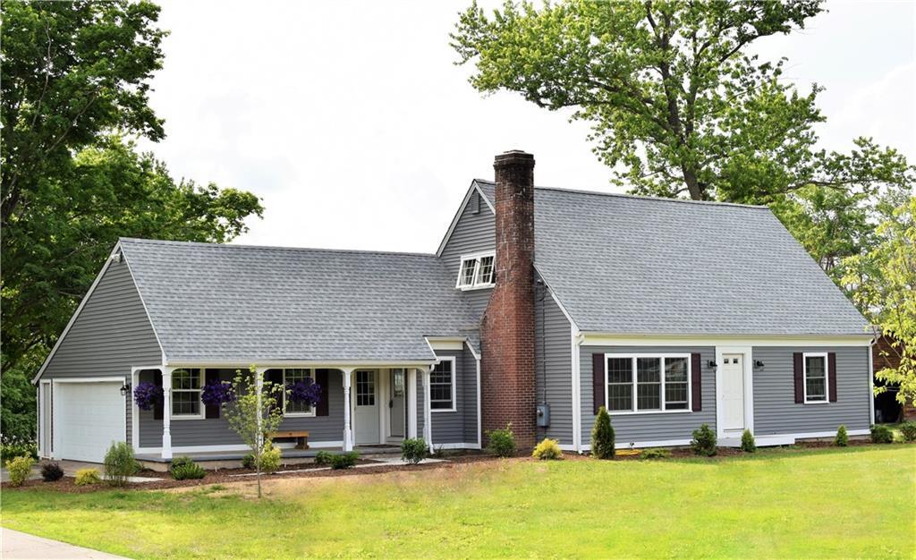 149 Ratley Road Suffield, CT 06093 - Photo 1 of 1 a backyard of a house with yard table and chairs
