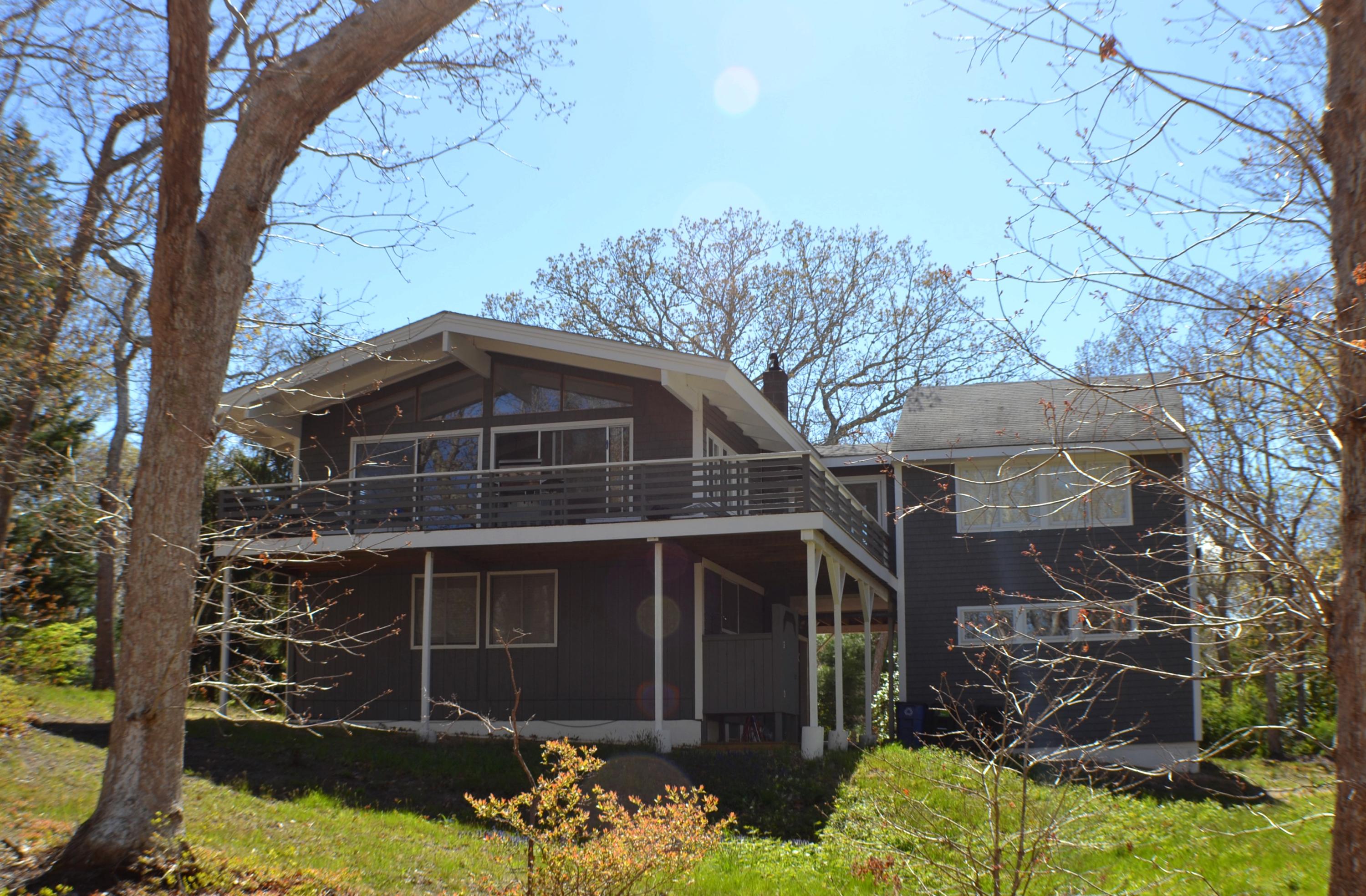 42 Farm Pond Road Oak Bluffs, MA 02557 - Photo 1 of 1 a front view of a house with a yard