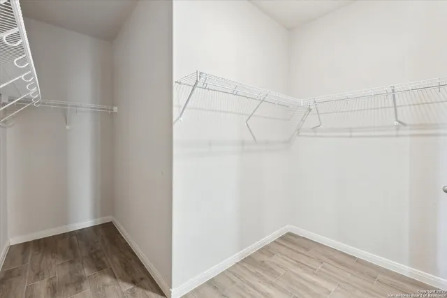 a view of a room with racks on the wall