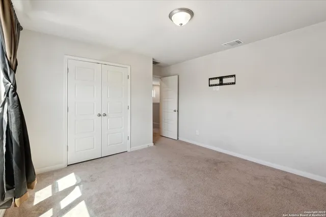 a bathroom with a double vanity sink toilet and a bathtub