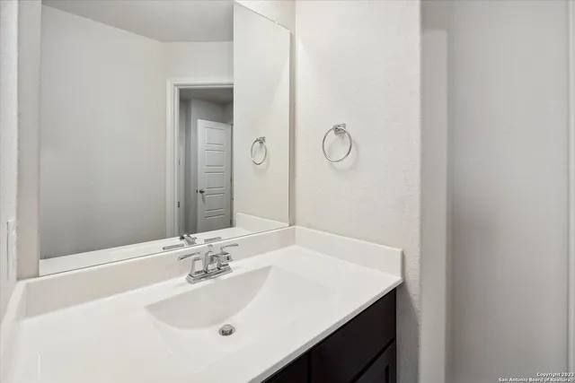 a bathroom with a bathtub toilet and shower