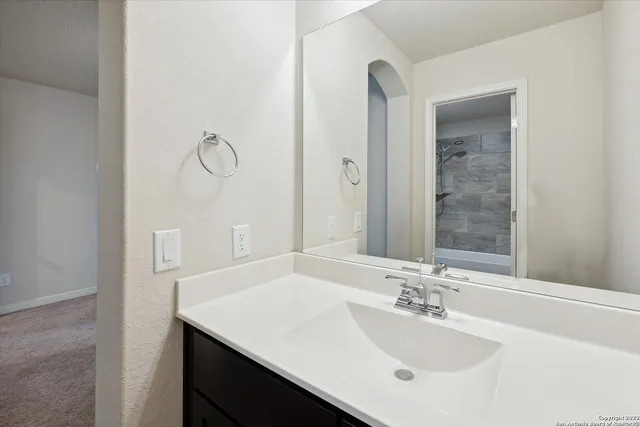 an empty room with shelves