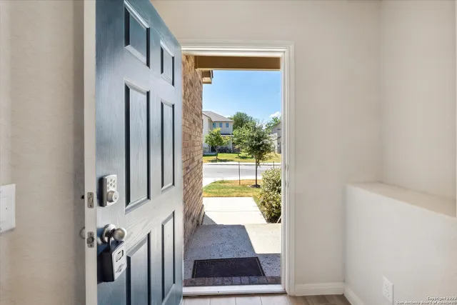 a view of a porch with furniture