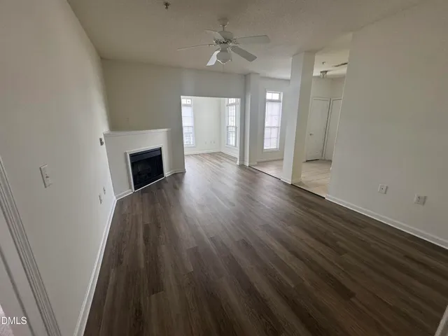a bathroom with a toilet and a mirror