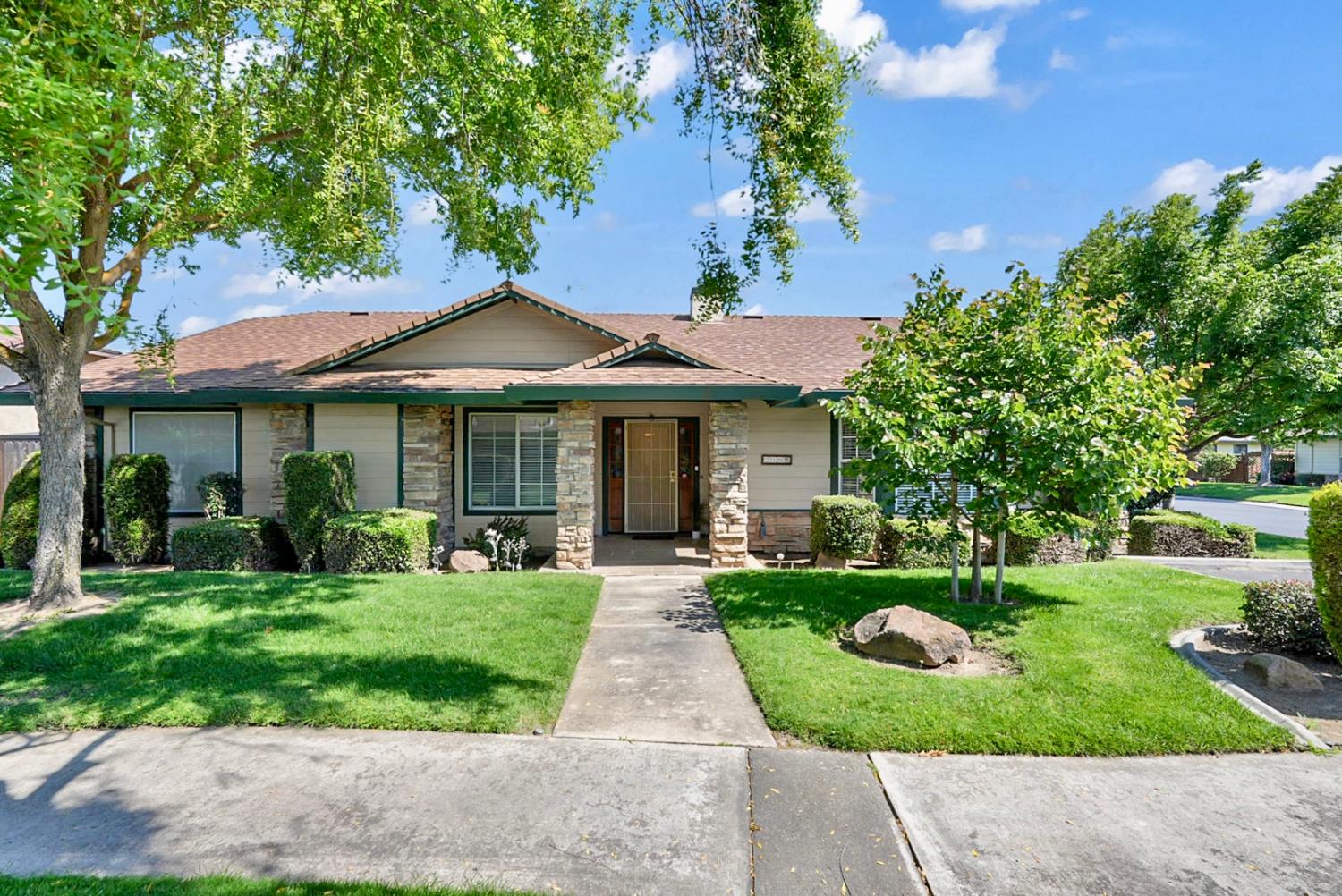 2195 Brigadoon Walk Manteca, CA 95336 - Photo 1 of 41 a front view of a house with a yard