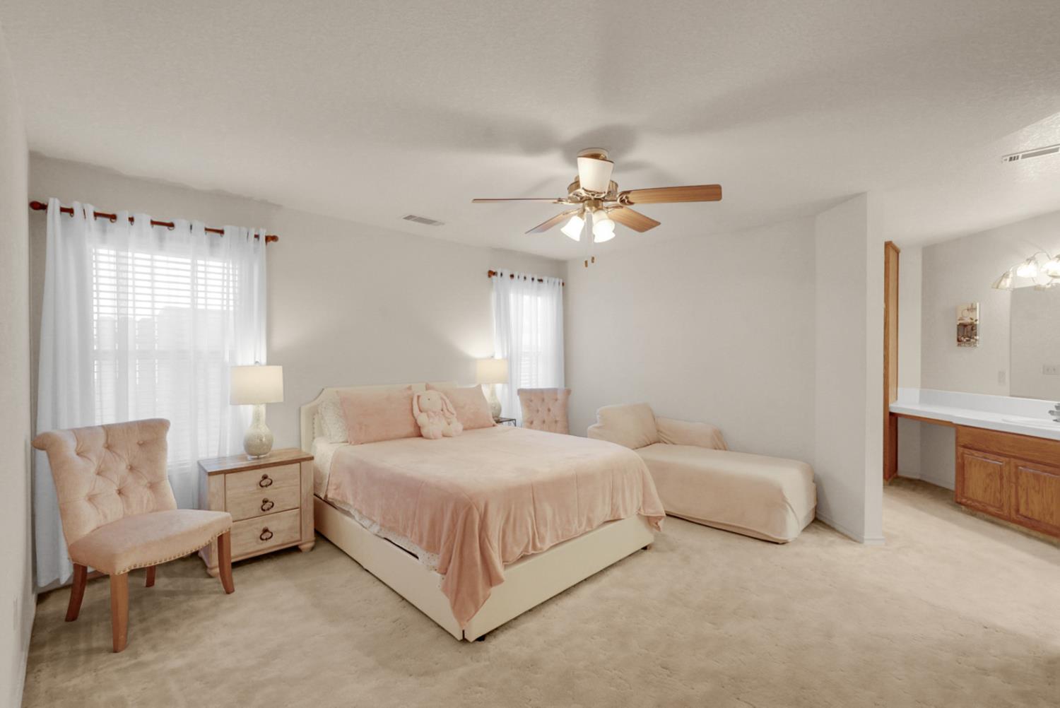 2195 Brigadoon Walk Manteca, CA 95336 - Photo 18 of 41 a bedroom with a bed couch and window
