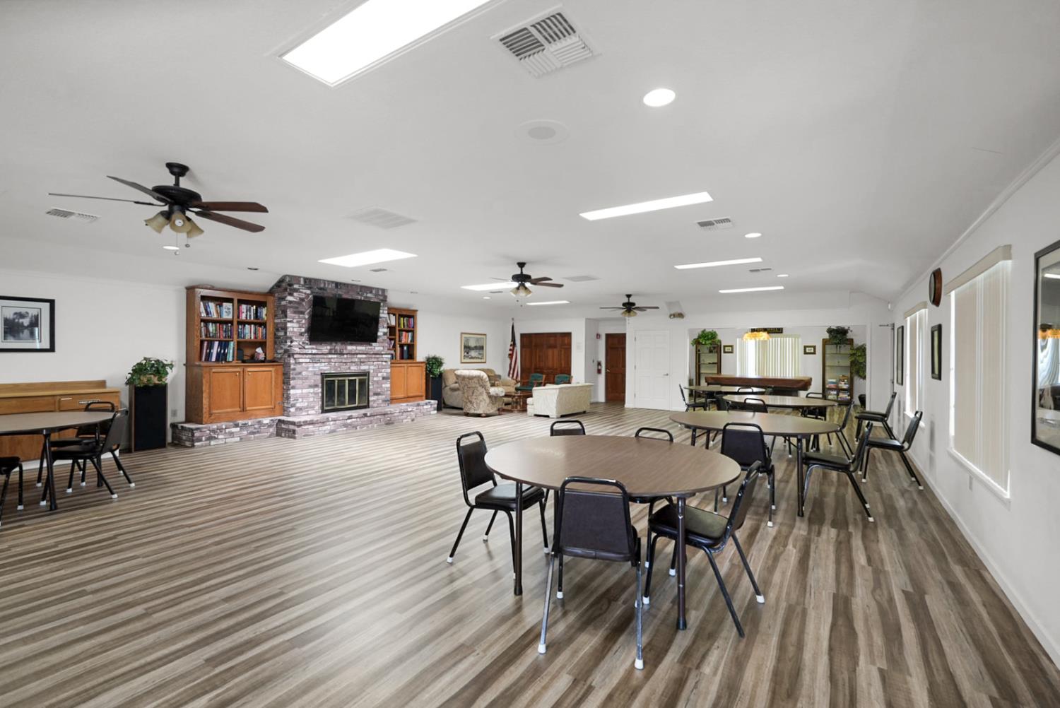 2195 Brigadoon Walk Manteca, CA 95336 - Photo 30 of 41 a view of a dining room with furniture and wooden floor