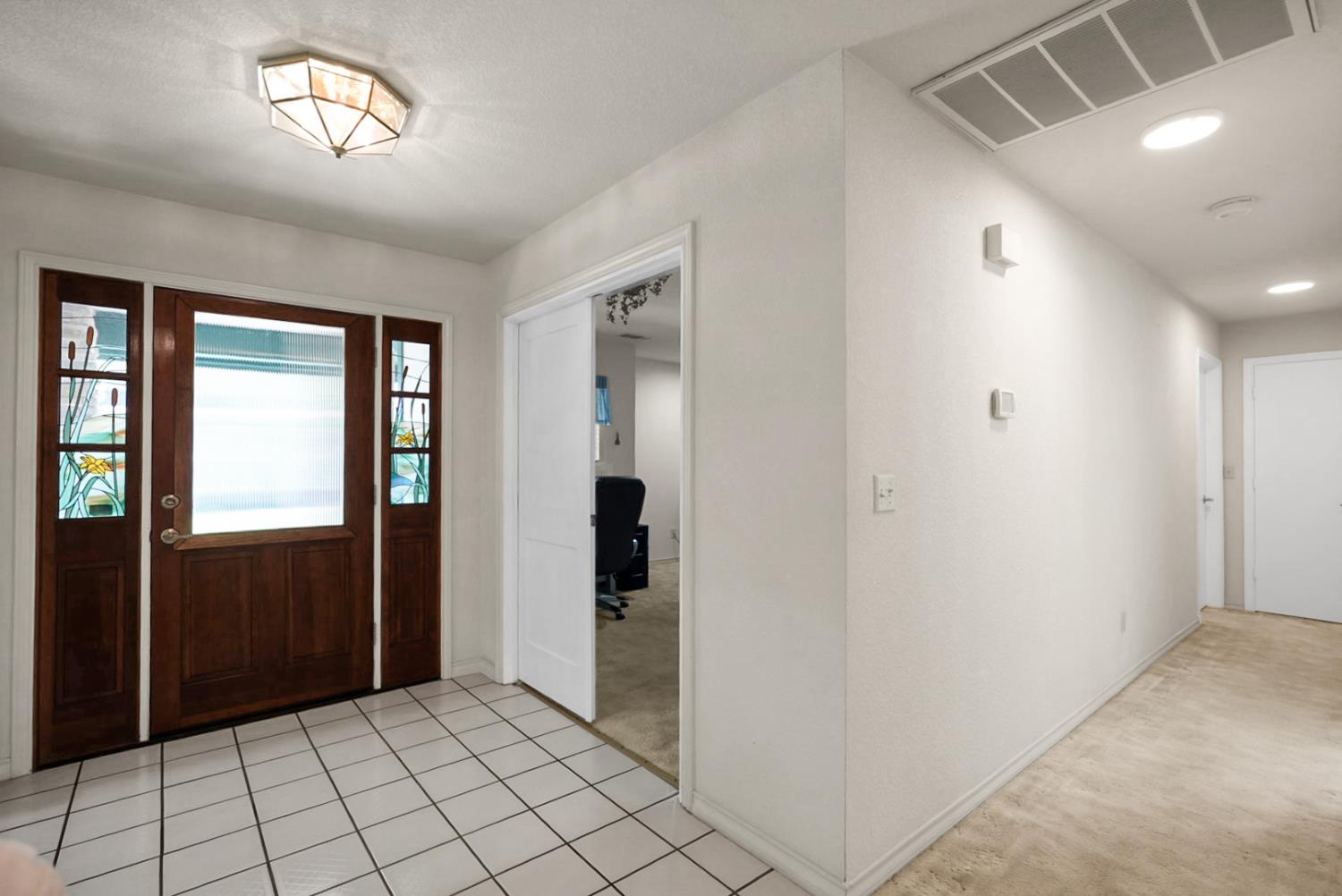 2195 Brigadoon Walk Manteca, CA 95336 - Photo 4 of 41 a view of an entryway with a livingroom