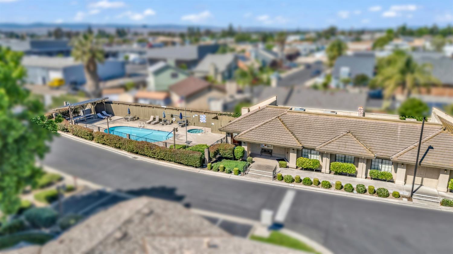 2195 Brigadoon Walk Manteca, CA 95336 - Photo 41 of 41 a small pool with couple of cars parked in the yard