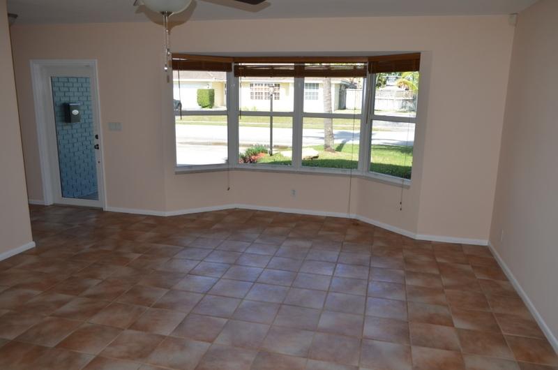 1140 Southwest 14th Street Boca Raton, FL 33486 - Photo 4 of 24 Front door entry and front bay window