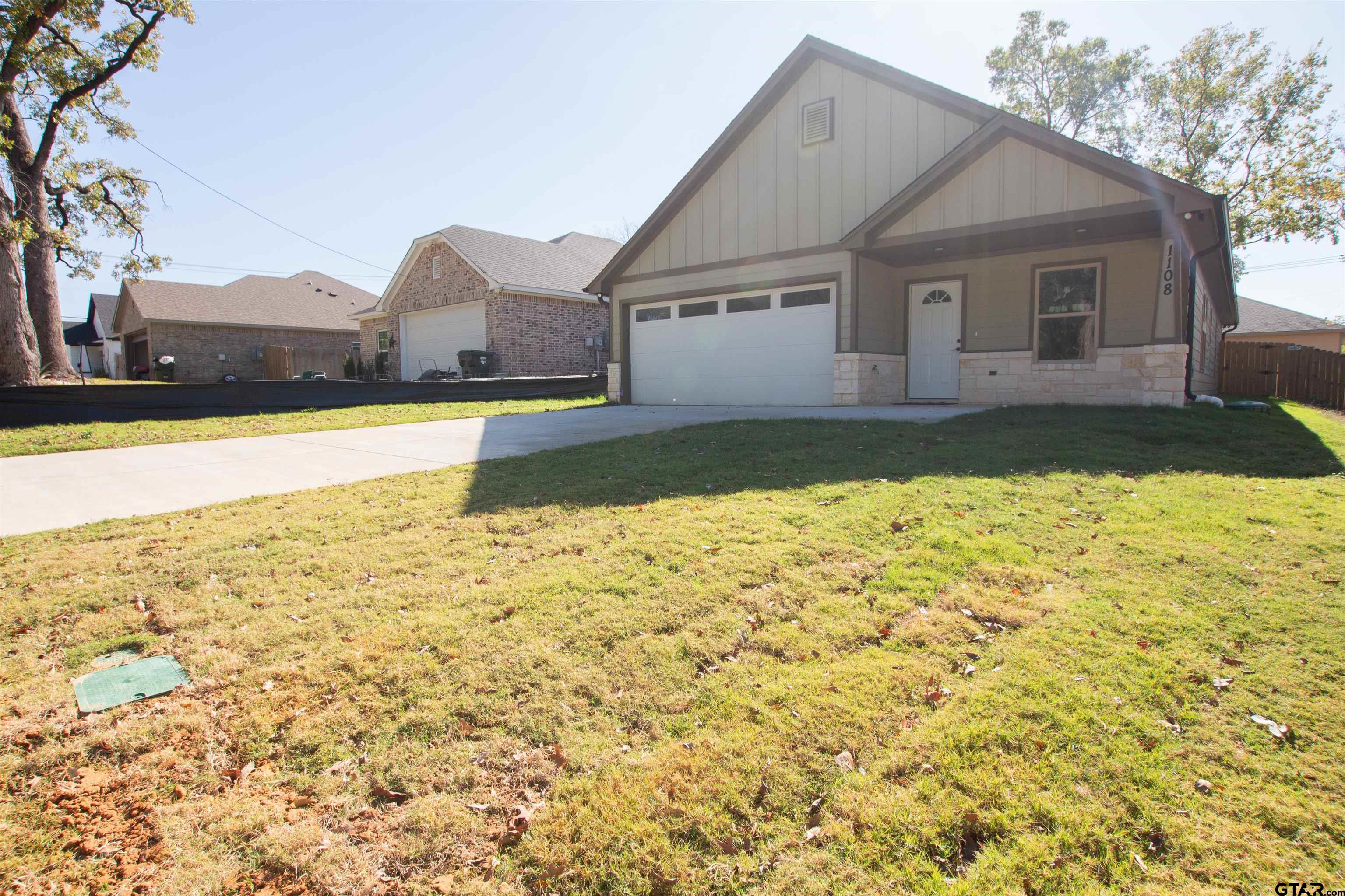 1108 Park Street Tyler, TX 75702 - Photo 2 of 27 a view of swimming pool with an outdoor space