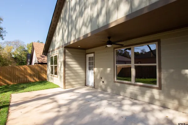 a view of backyard with green space