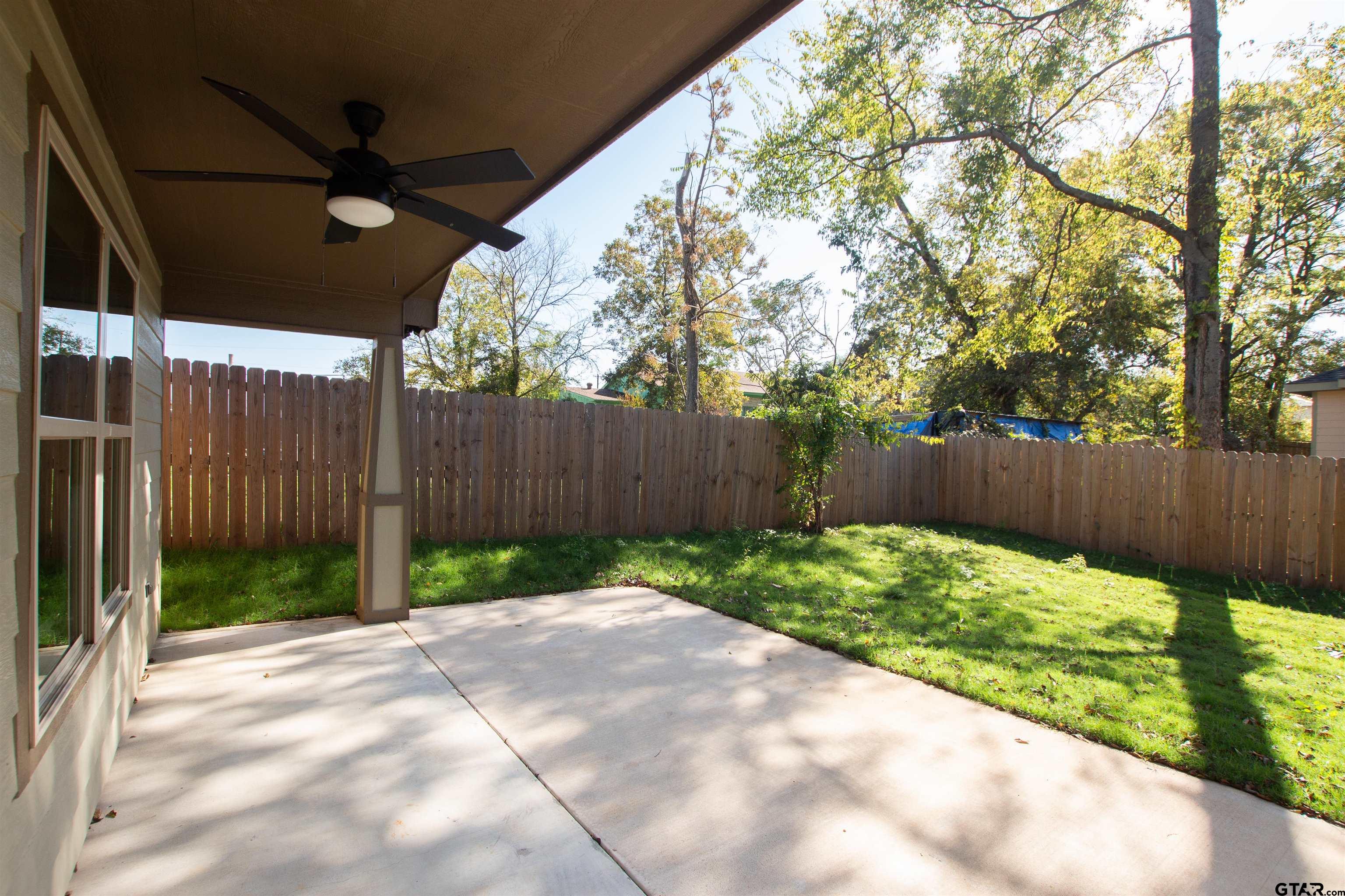 1108 Park Street Tyler, TX 75702 - Photo 24 of 27 a view of backyard with green space