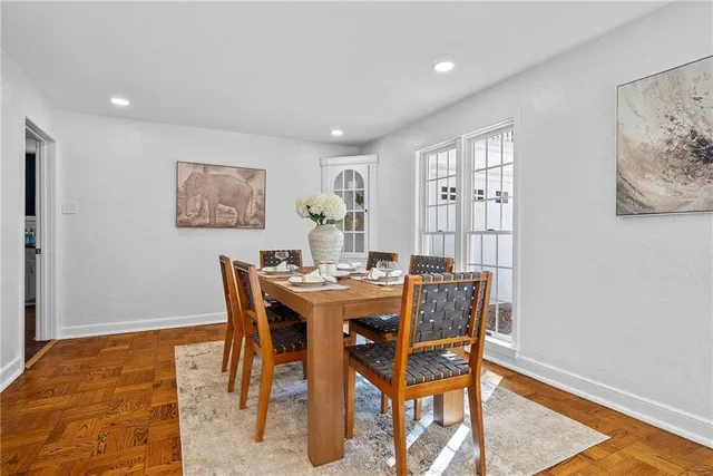 a view of a dining room with furniture