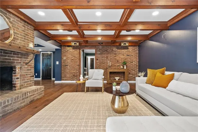 a outdoor living space with furniture and a fireplace