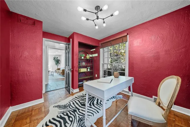 a view of a dining room with furniture window and outside view