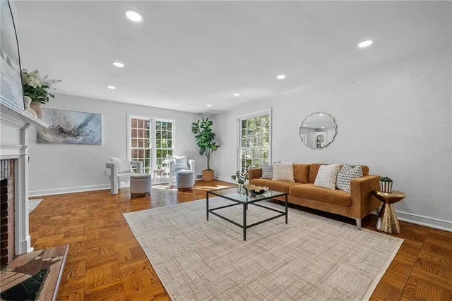 a living room with furniture and a table
