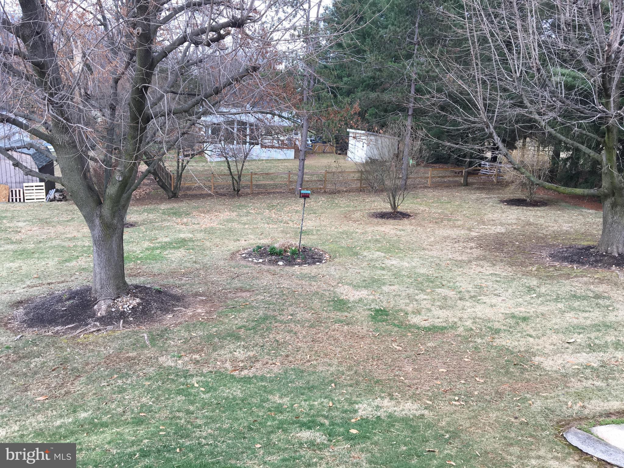 4504 Maple Grove Road Hampstead, MD 21074 - Photo 7 of 12 a backyard of a house with lots of green space