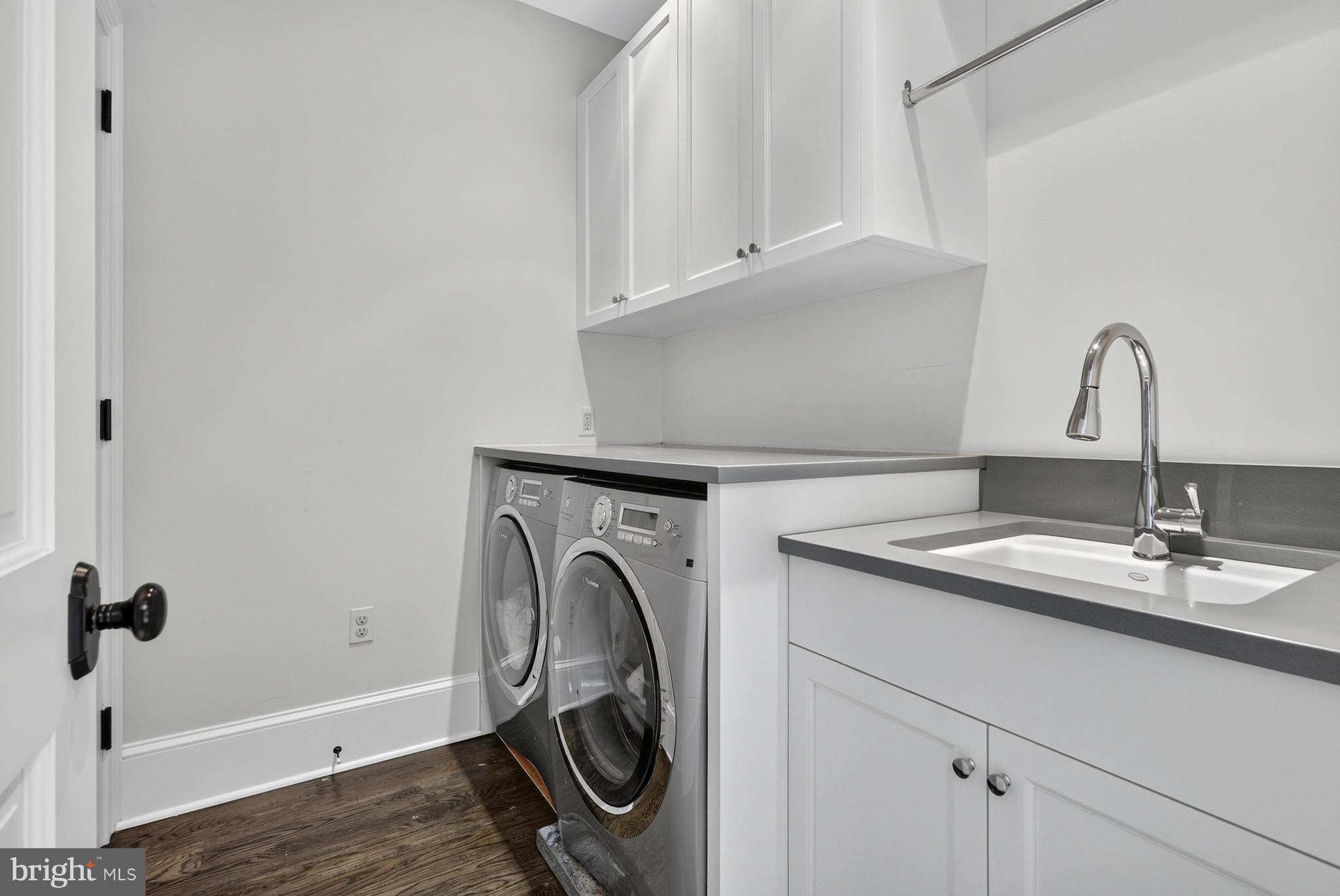2107 Foxhall Road Northwest Washington, DC 20007 - Photo 56 of 64 Laundry room with sink and storage
