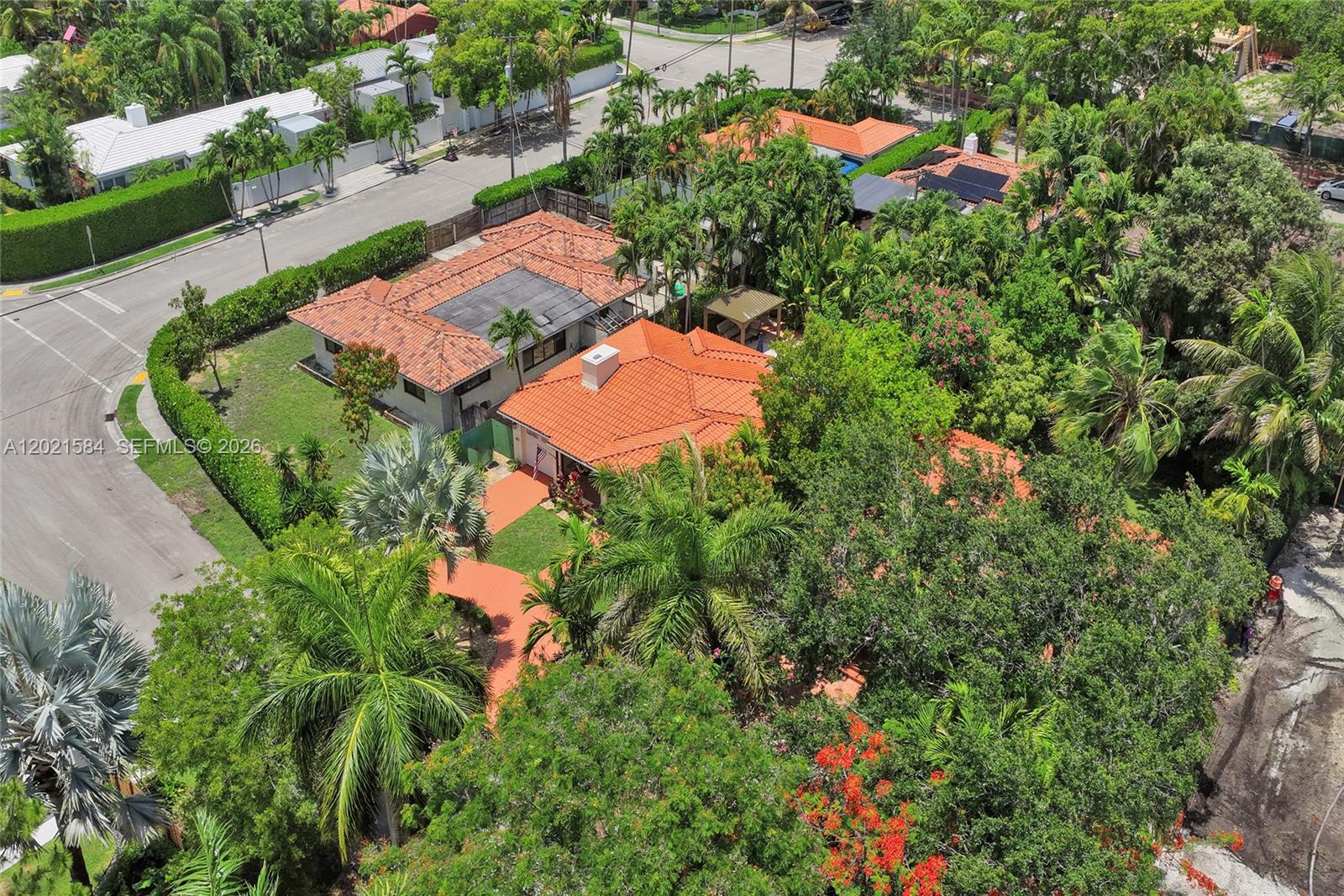 811 Northeast 73rd Street Miami, FL 33138 - Photo 43 of 51 an aerial view of a house with a yard and lake view