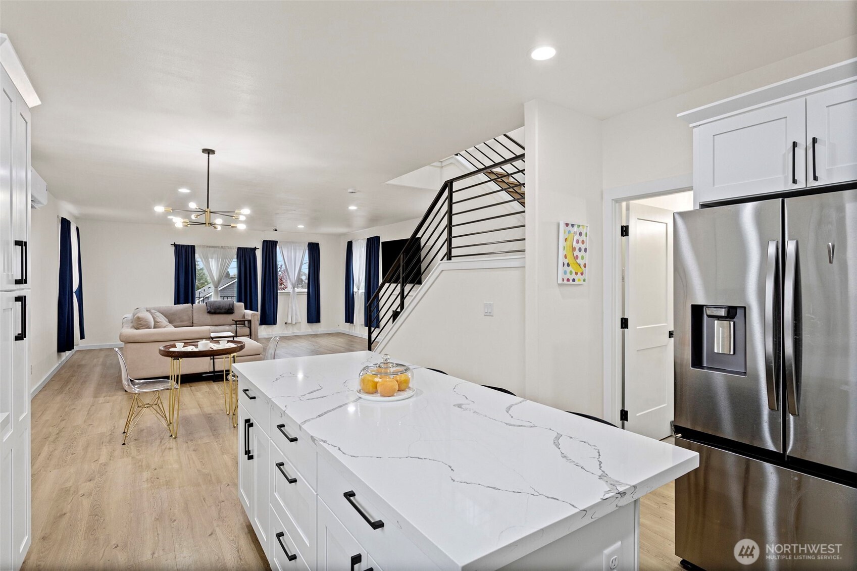 10615 2nd Place Southwest Seattle, WA 98146 - Photo 2 of 28 a kitchen with refrigerator a stove and a sink