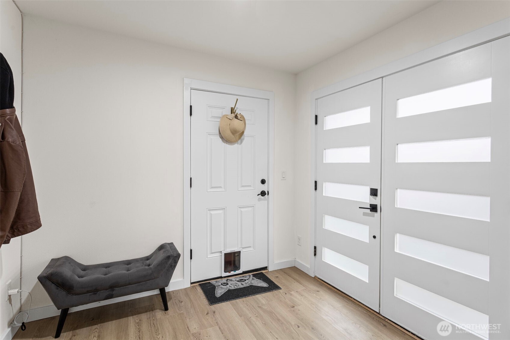 10615 2nd Place Southwest Seattle, WA 98146 - Photo 26 of 28 a view of a room with wooden floor lounge chair and windows