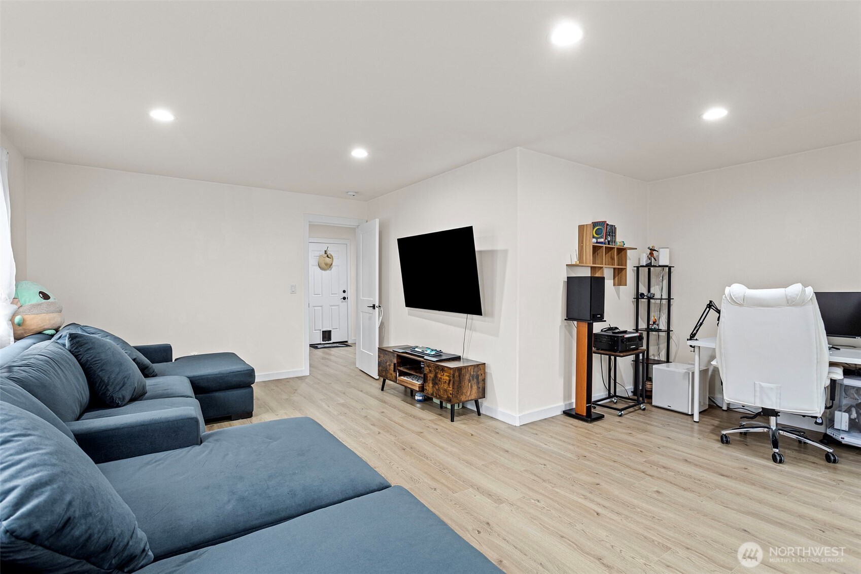 10615 2nd Place Southwest Seattle, WA 98146 - Photo 5 of 28 a living room with furniture and a flat screen tv