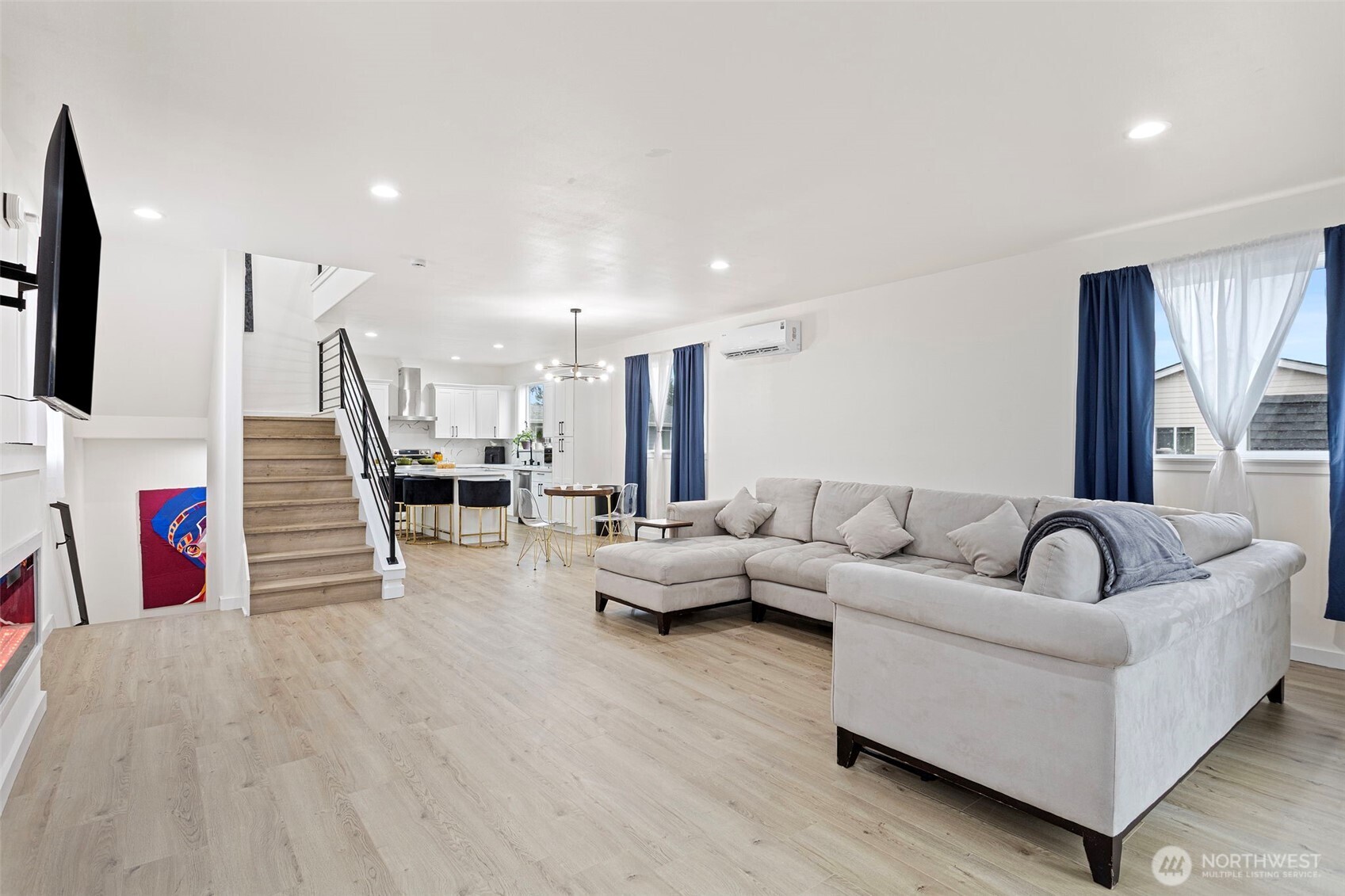 10615 2nd Place Southwest Seattle, WA 98146 - Photo 7 of 28 a living room with furniture and a wooden floor