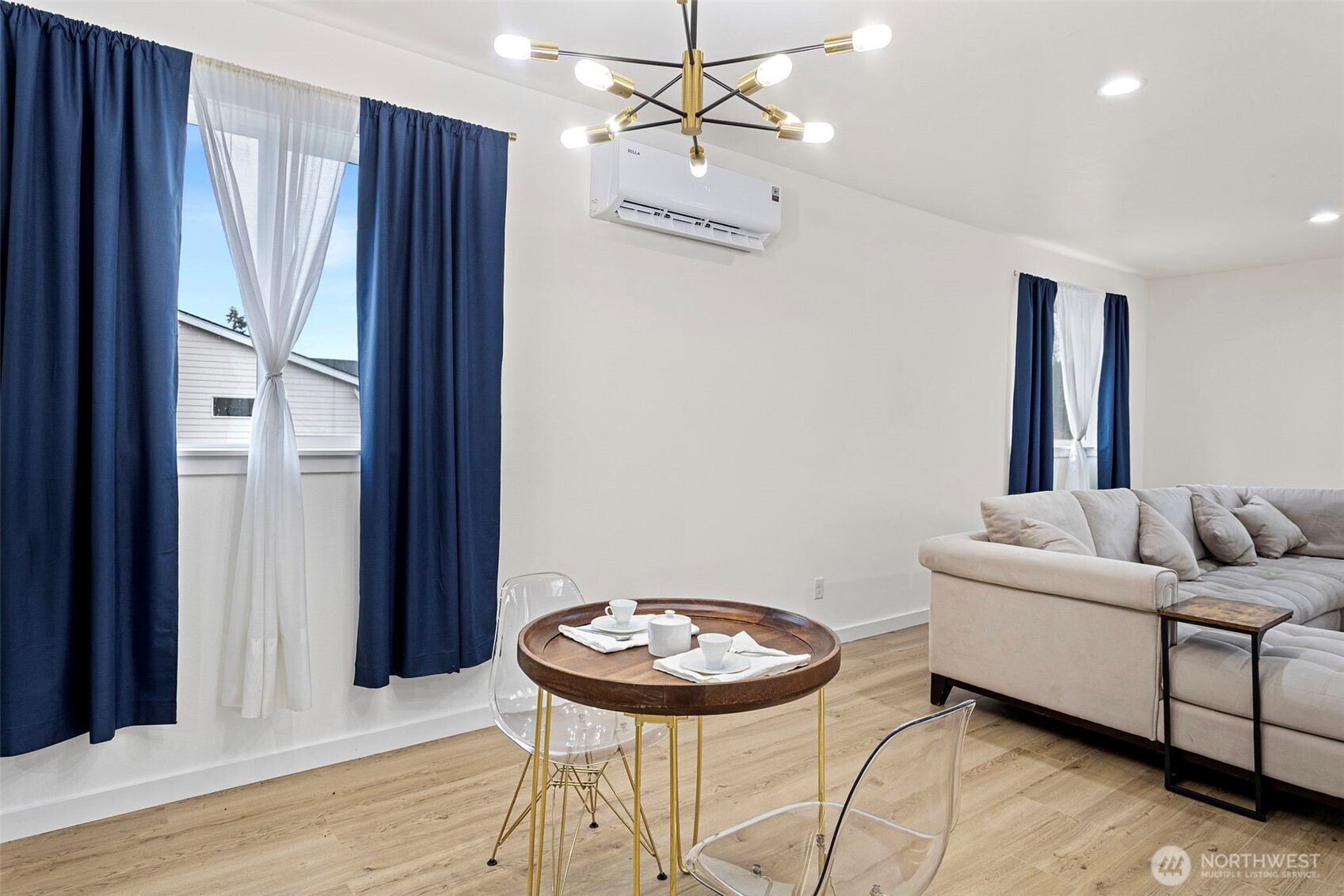 10615 2nd Place Southwest Seattle, WA 98146 - Photo 9 of 28 a living room with furniture and a wooden floor