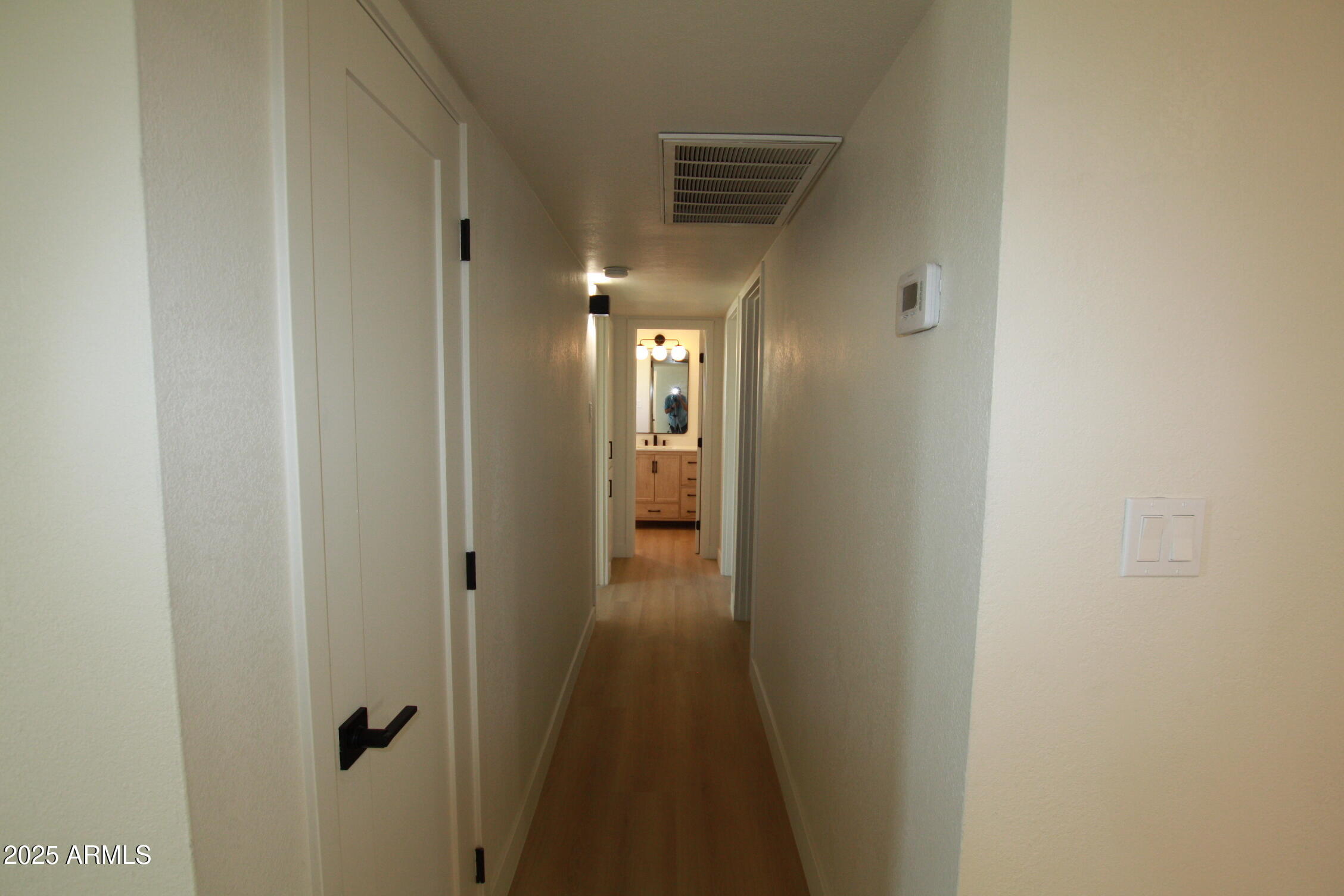 443 North Sycamore Mesa, AZ 85201 - Photo 14 of 33 a view of a hallway with wooden floor