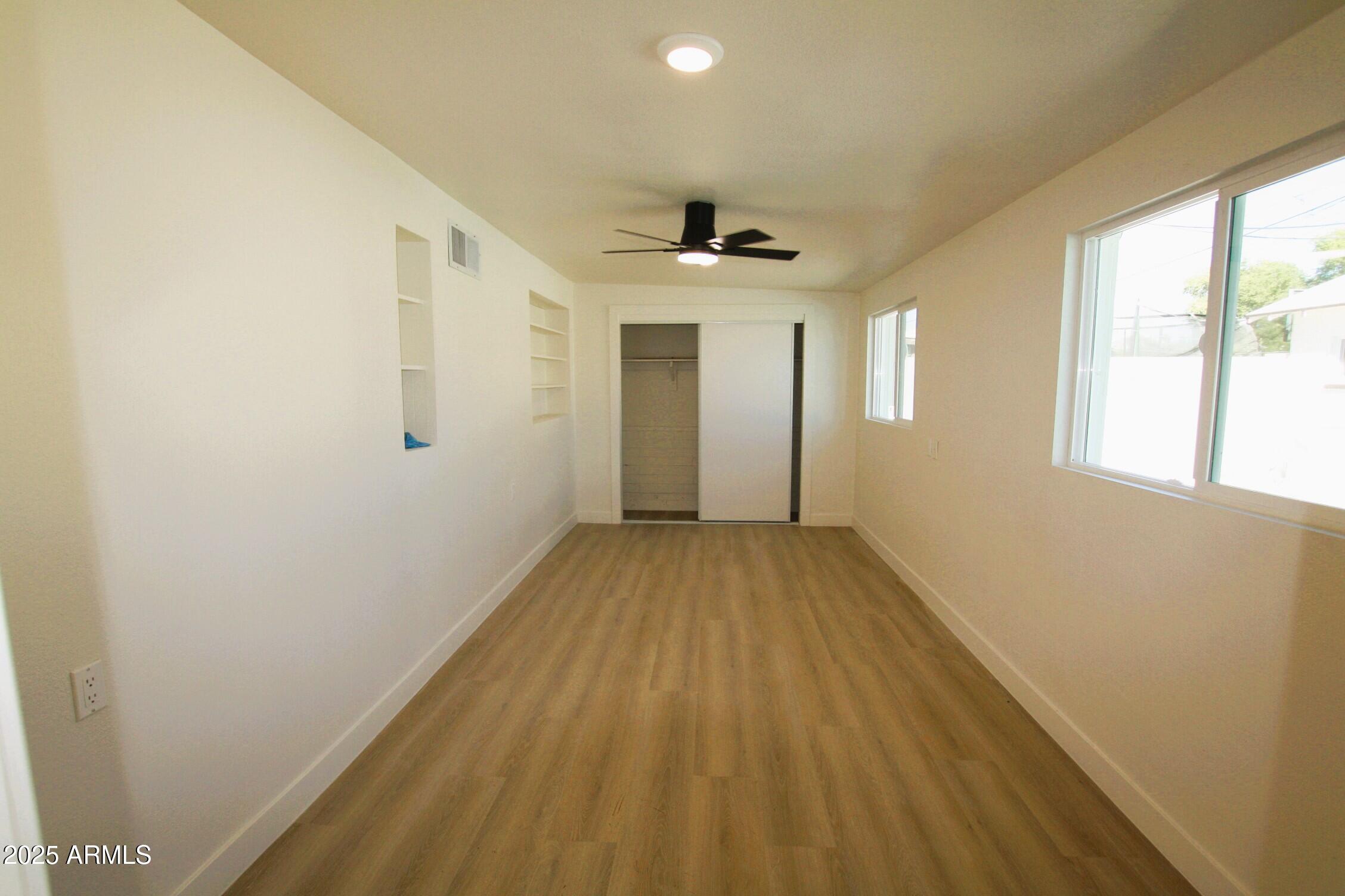 443 North Sycamore Mesa, AZ 85201 - Photo 21 of 33 a view of a room with wooden floor and windows