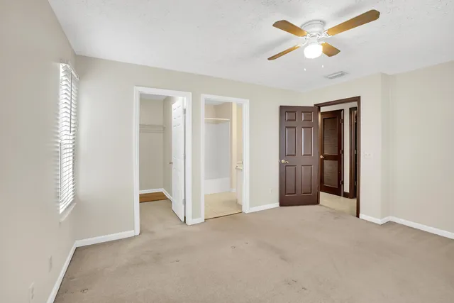 a view of a room with racks on the wall