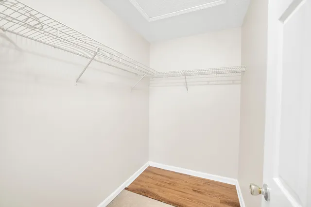 a bathroom with a bathtub and a toilet