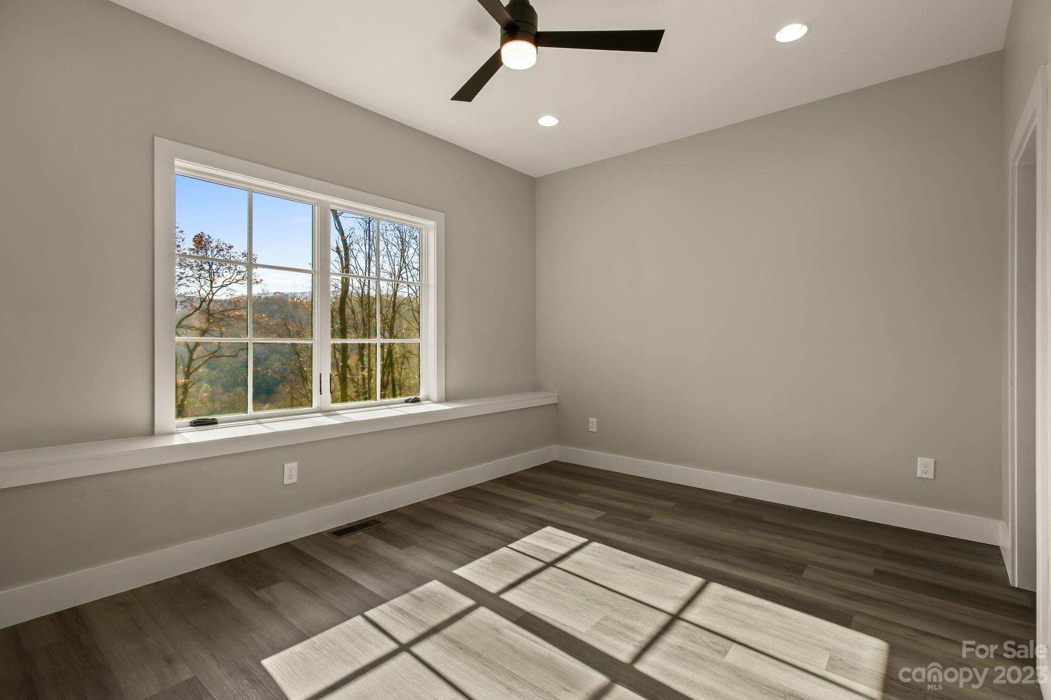 1736 Twin Rivers Drive Boone, NC 28607 - Photo 33 of 48 a view of an empty room with a window