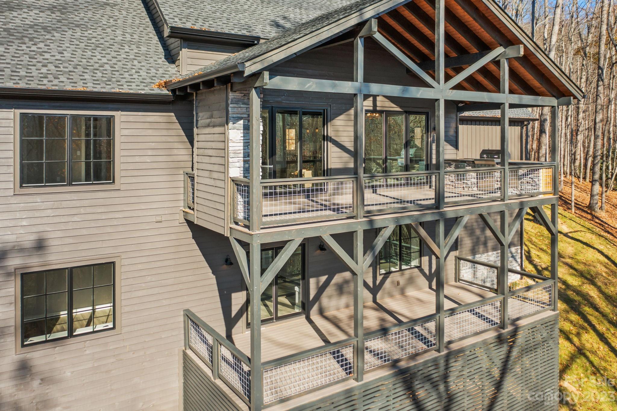1736 Twin Rivers Drive Boone, NC 28607 - Photo 42 of 48 a view of a chairs and table in the balcony