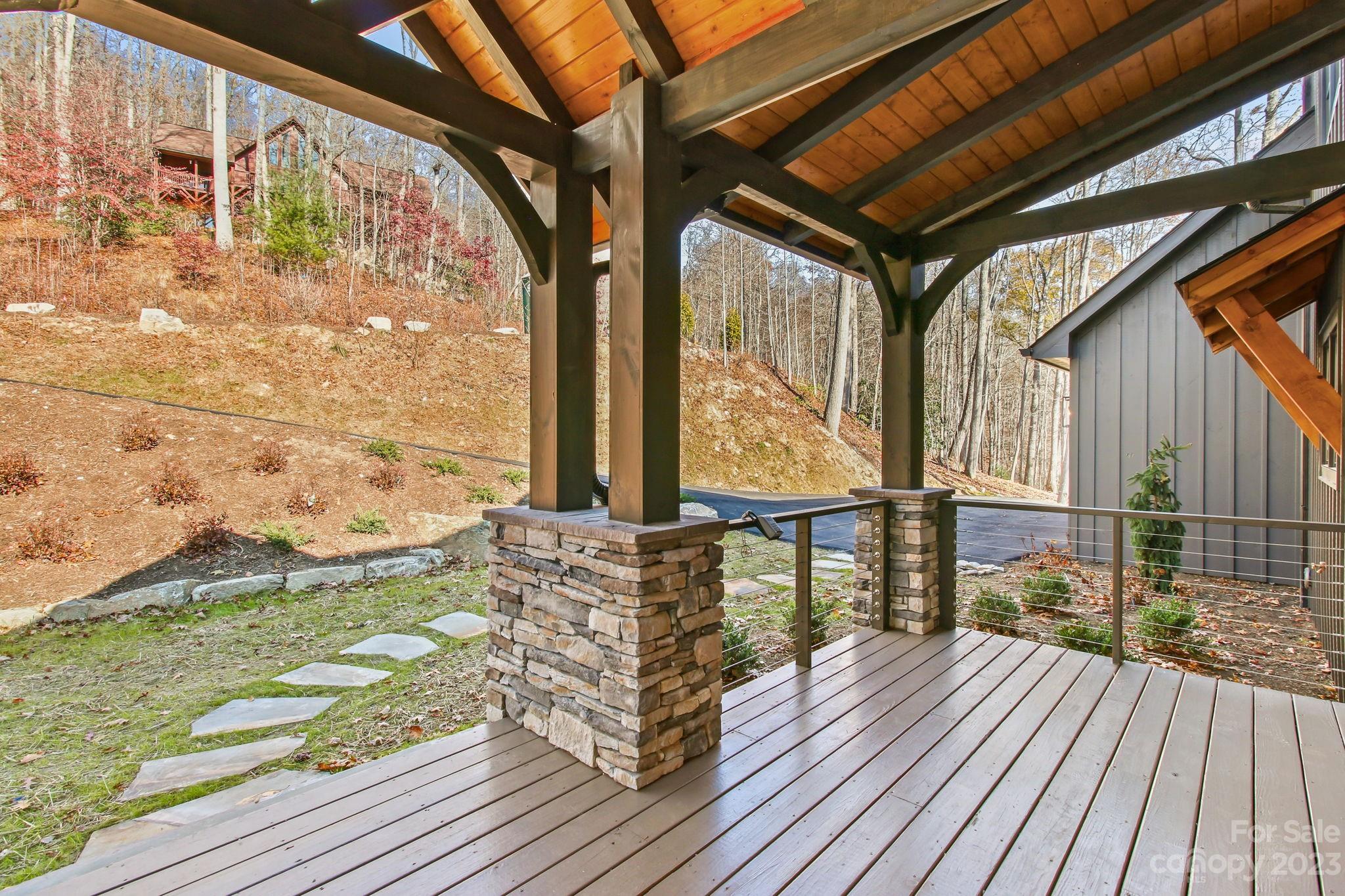 1736 Twin Rivers Drive Boone, NC 28607 - Photo 5 of 48 a balcony with wooden floor