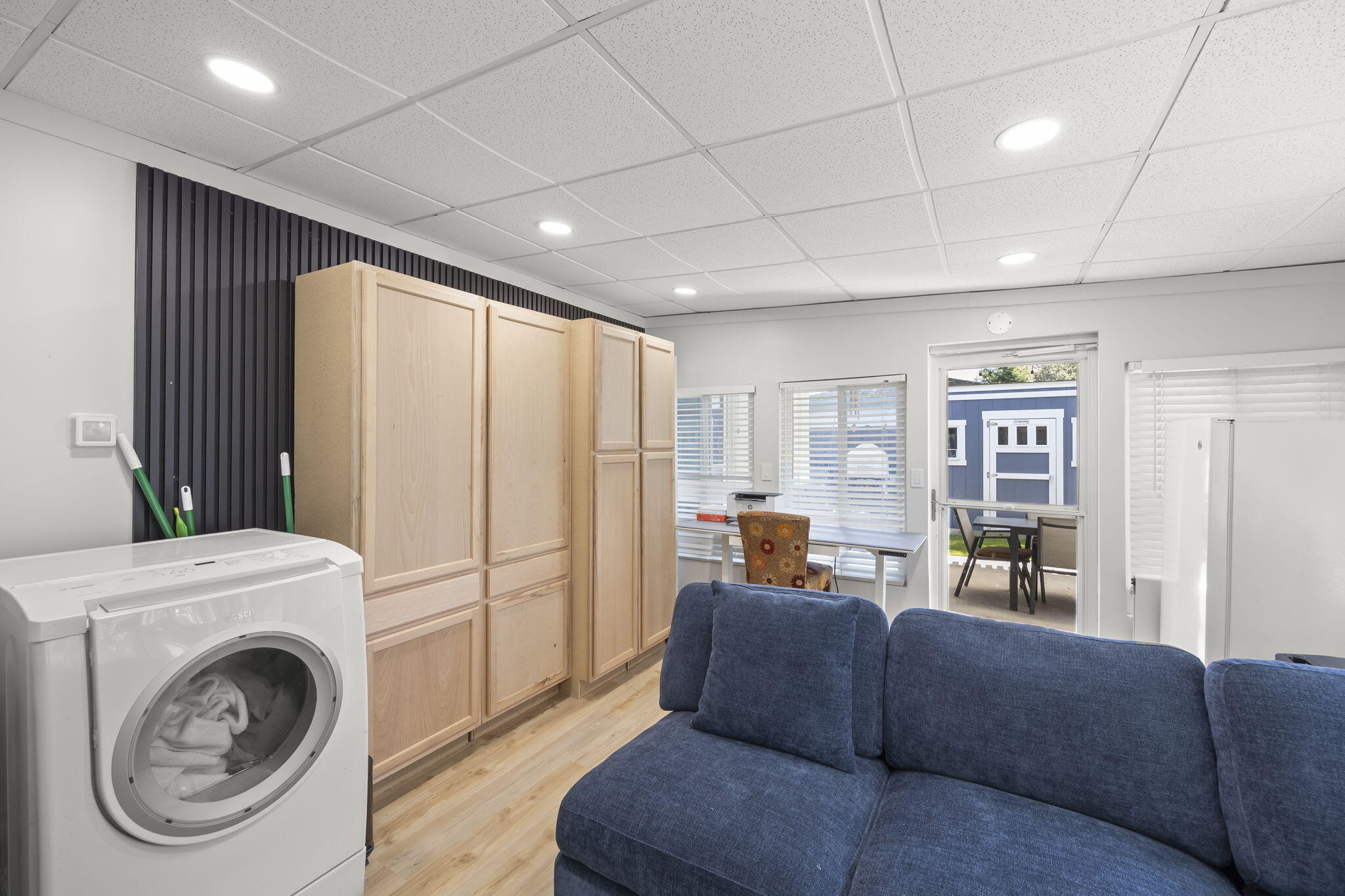 301 Park Road Ojai, CA 93023 - Photo 26 of 38 a living room with furniture a large window with kitchen view