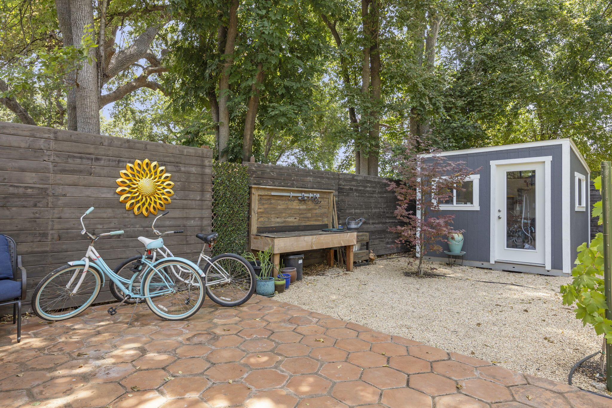 301 Park Road Ojai, CA 93023 - Photo 30 of 38 a view of a patio with table and chairs a barbeque