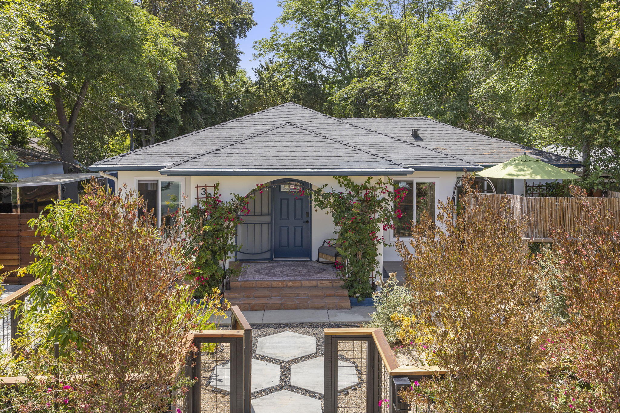 301 Park Road Ojai, CA 93023 - Photo 3 of 38 a house with trees in front of it