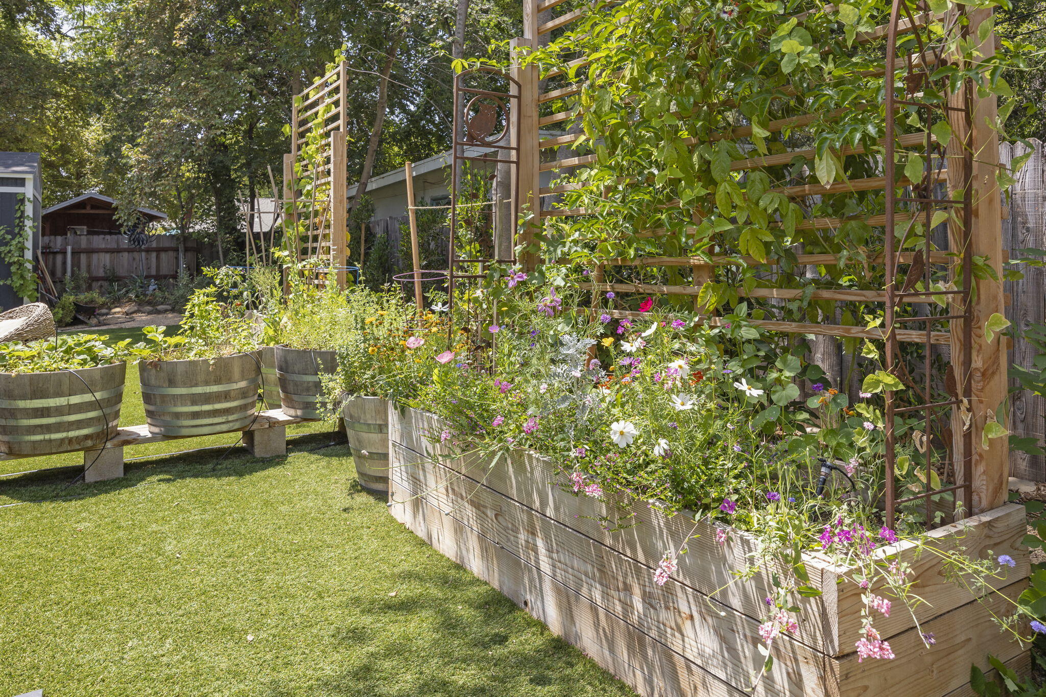 301 Park Road Ojai, CA 93023 - Photo 33 of 38 a view of a chair and table in backyard of the house