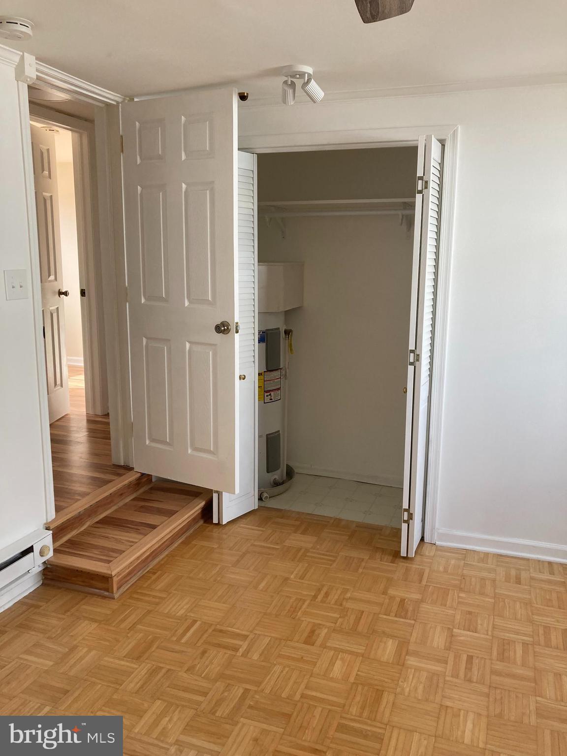 720 Berry Road, Unit 95 Wilmington, DE 19810 - Photo 9 of 12 an empty room with a door