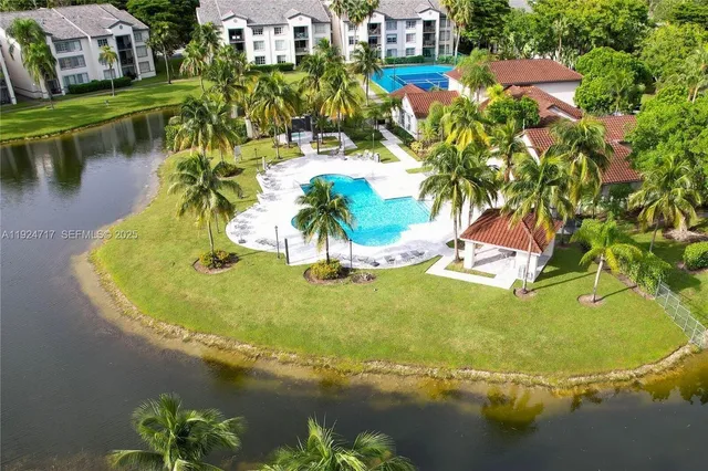 a view of a lake with a building in the background