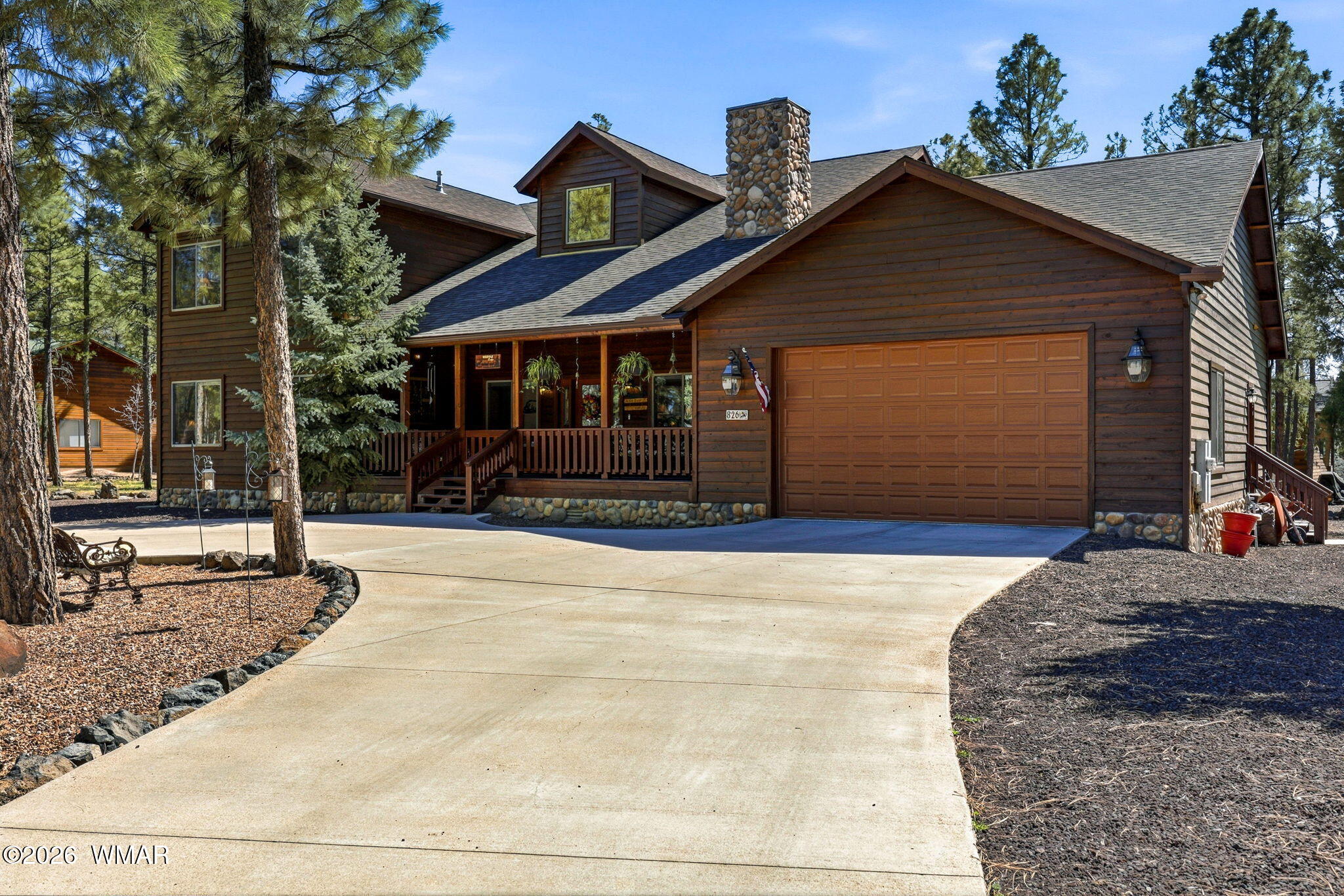 826 Pine Creek Circle Lakeside, AZ 85929 - Photo 43 of 65 a front view of a house with garage