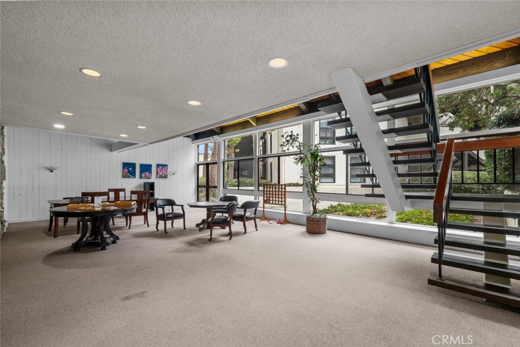 7740 Redlands Street, Unit G1097 Playa del Rey, CA 90293 - Photo 29 of 37 a view of a projector room with furniture and a window