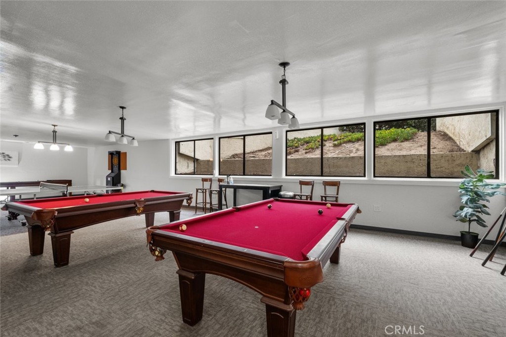 7740 Redlands Street, Unit G1097 Playa del Rey, CA 90293 - Photo 30 of 37 a room with pool table and windows