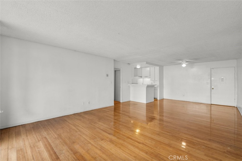 7740 Redlands Street, Unit G1097 Playa del Rey, CA 90293 - Photo 7 of 37 a view of empty room with wooden floor
